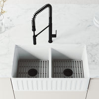 Pull-down kitchen faucet in matte black finish with secure docking station