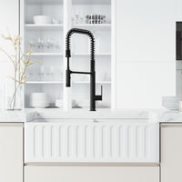 High-arc gooseneck kitchen faucet with lever handle and spot-resistant surface