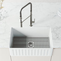 Pull-down kitchen faucet in stainless steel with secure docking station