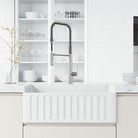 High-arc kitchen faucet with lever handle and spot-resistant surface