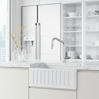 Kitchen faucet with ceramic disc cartridge and pull-down spray function