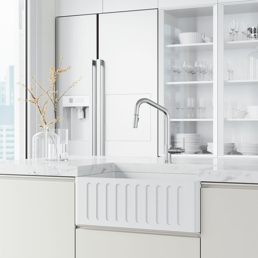 Kitchen faucet with ceramic disc cartridge and pull-down spray function