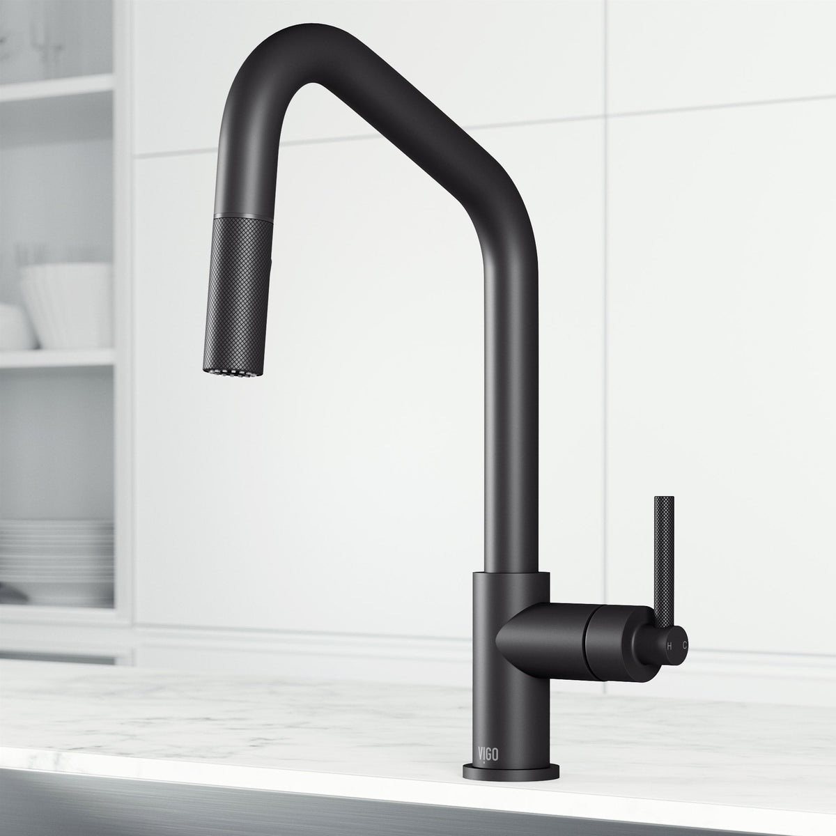Matte black single handle kitchen faucet with pull-down sprayer and high-arc spout