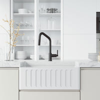 Deck-mounted kitchen faucet with included hose and sprayer head