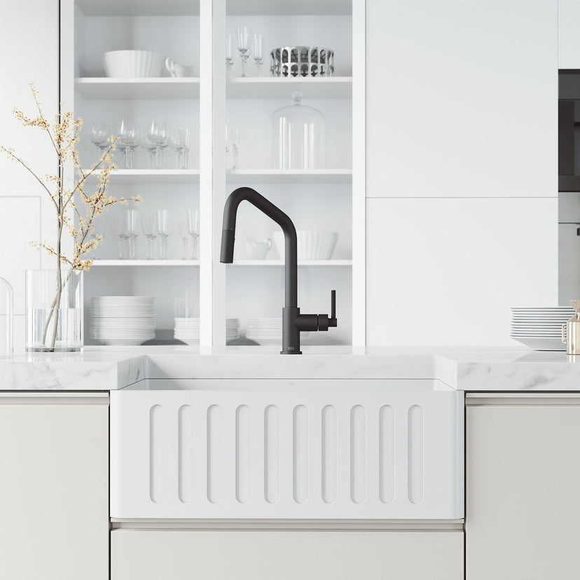 Deck-mounted kitchen faucet with included hose and sprayer head