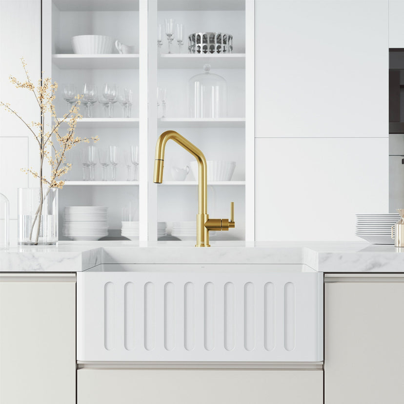 Deck-mounted kitchen faucet with included hose and sprayer head