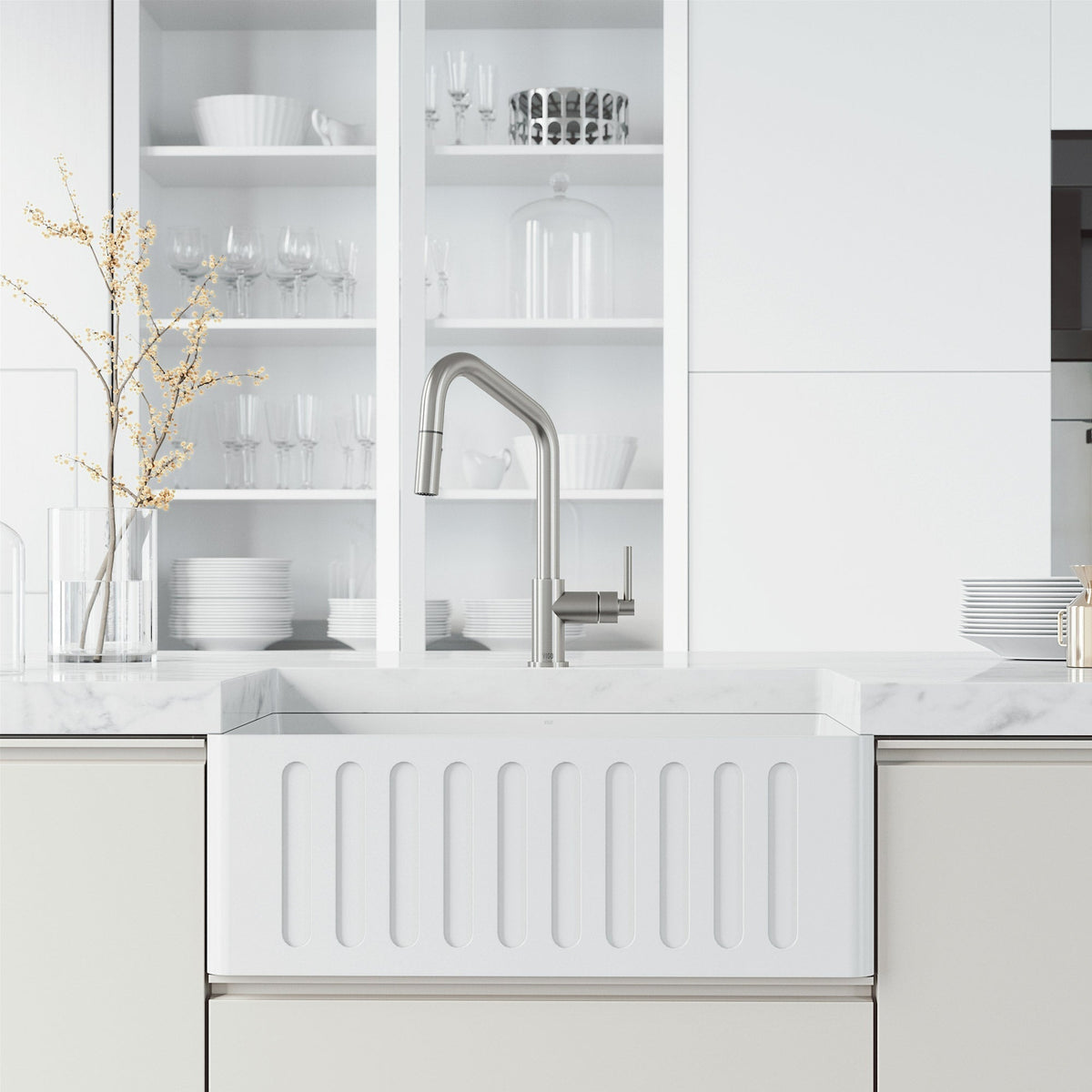 Deck-mounted kitchen faucet with included hose and sprayer head