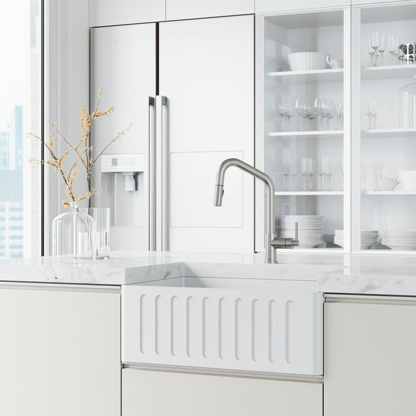 Kitchen faucet with ceramic disc cartridge and pull-down spray function