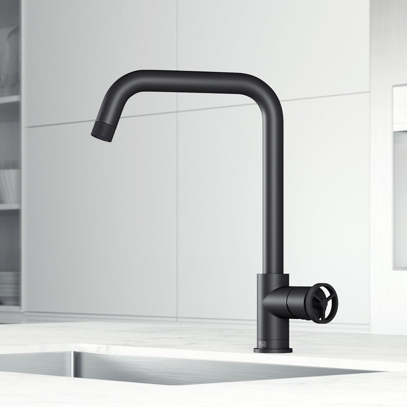 Kitchen faucet with 360-degree swivel spout and secure docking technology in matte black
