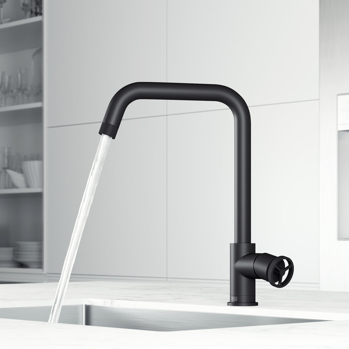 Modern deck-mounted kitchen faucet in matte black with lever handle and docking station