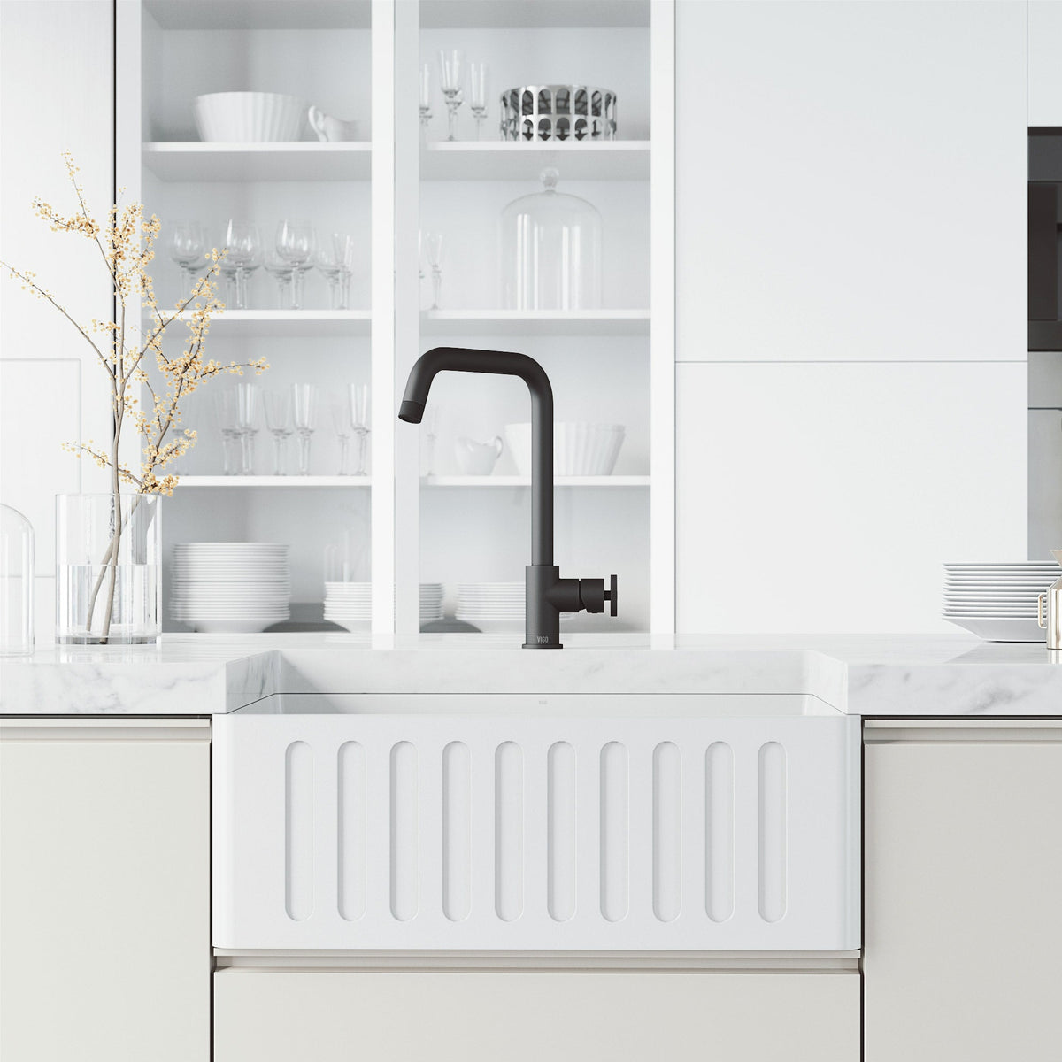 Deck mount single handle faucet with included supply lines and matte black finish