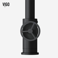 Matte black kitchen faucet with sprayer docking station and durable brass construction