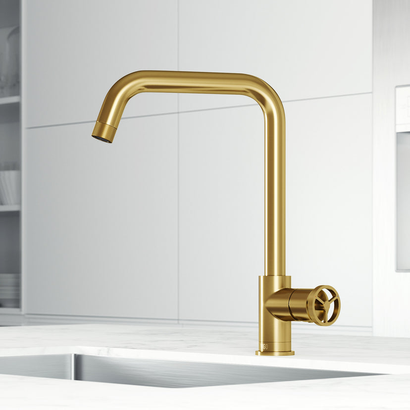 Kitchen faucet with 360-degree swivel spout and secure docking in brushed gold