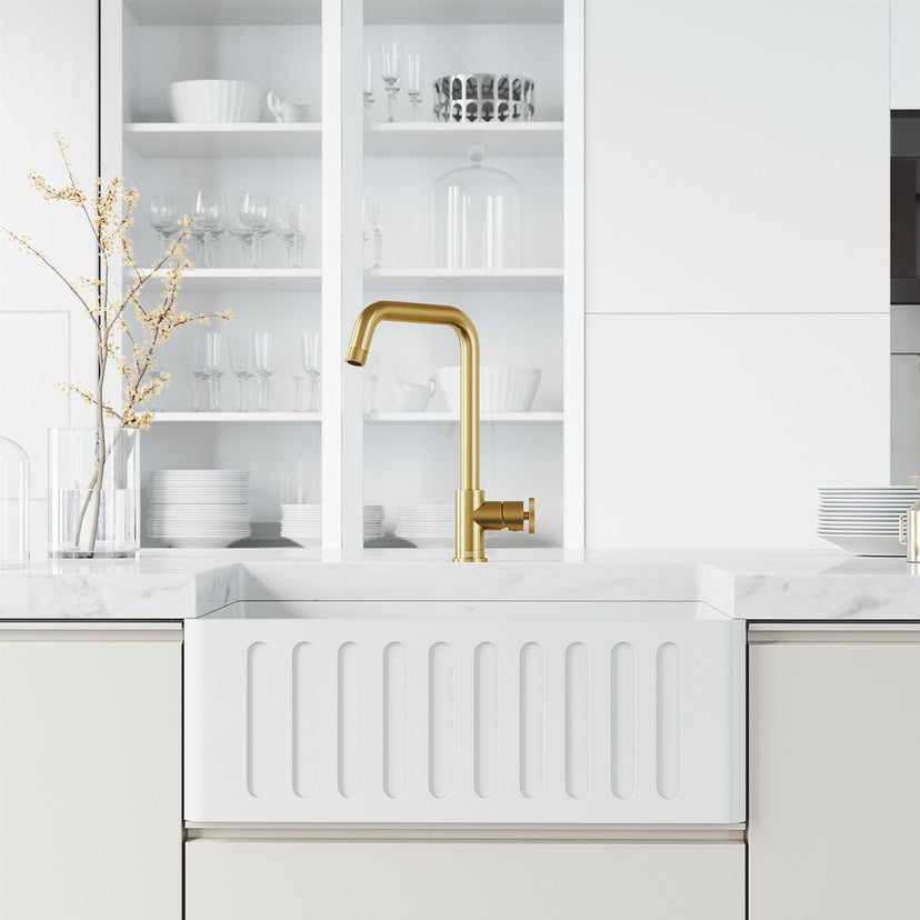 Deck mount single handle faucet with included supply lines and brushed gold finish