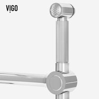 VIGO Cass Kitchen faucet with pull-out side sprayer in chrome finish with exposed bridge design and 360° swivel spout