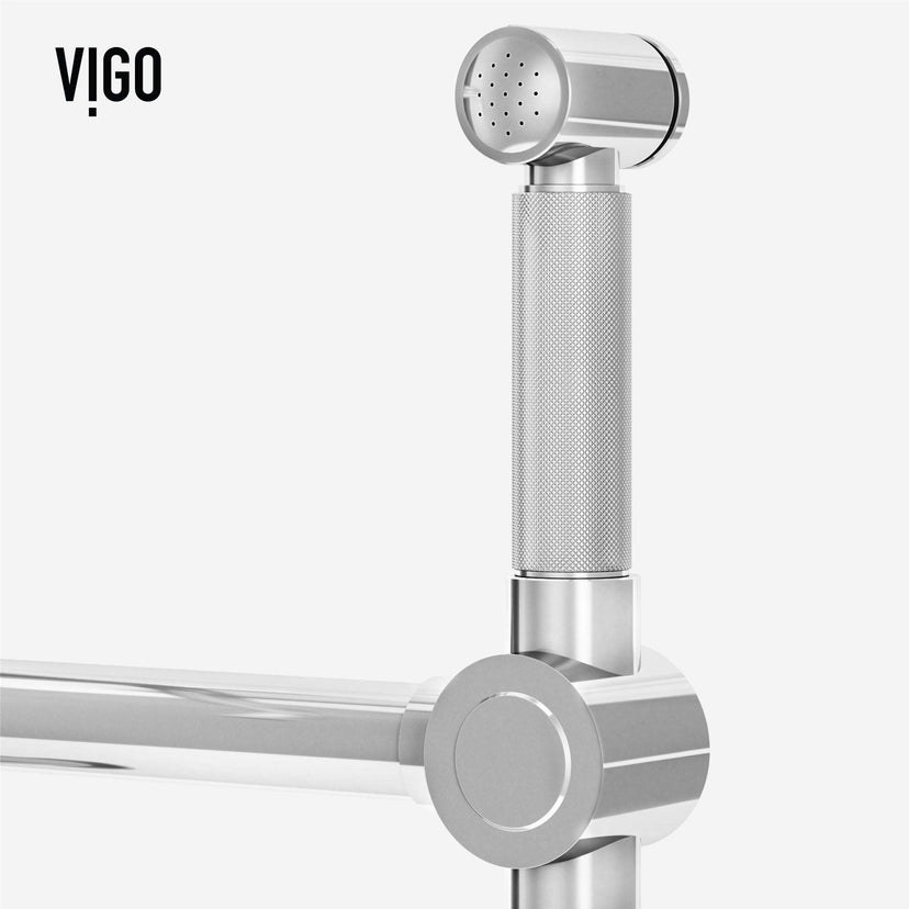 VIGO Cass Kitchen faucet with pull-out side sprayer in chrome finish with exposed bridge design and 360° swivel spout