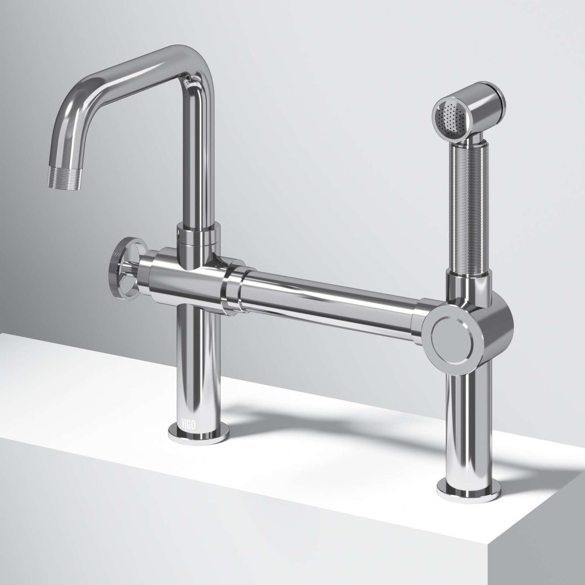 Chrome kitchen faucet with pull-out sprayer and bridge design