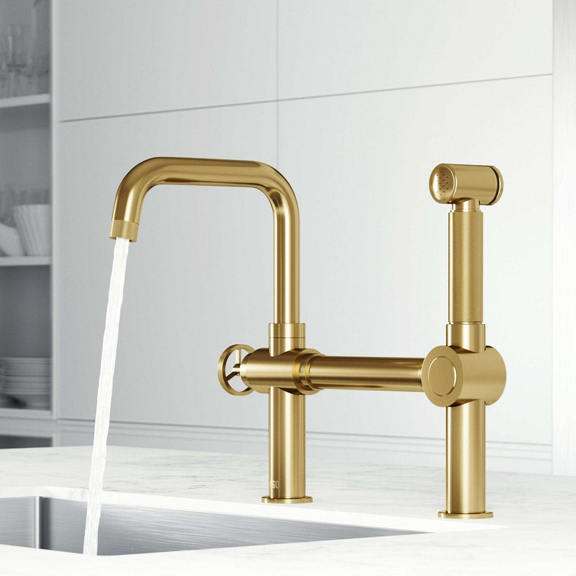 VIGO Cass kitchen faucet with pull-out side sprayer in chrome with exposed bridge design and wheel handle
