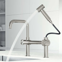 Chrome kitchen faucet with pull-out side sprayer and industrial bridge design