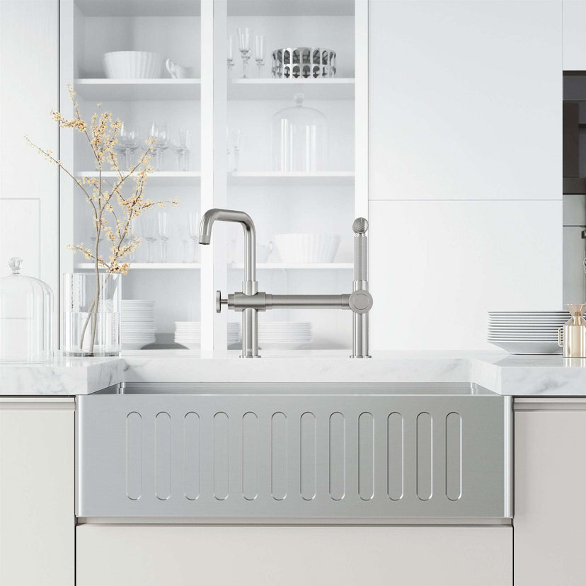 Chrome Cass kitchen faucet with pull-out sprayer and industrial bridge design