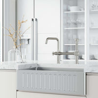 Chrome Cass kitchen faucet with pull-out sprayer and exposed bridge design