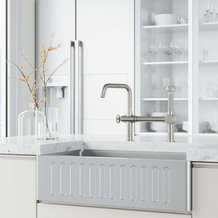 Chrome Cass kitchen faucet with pull-out sprayer and exposed bridge design
