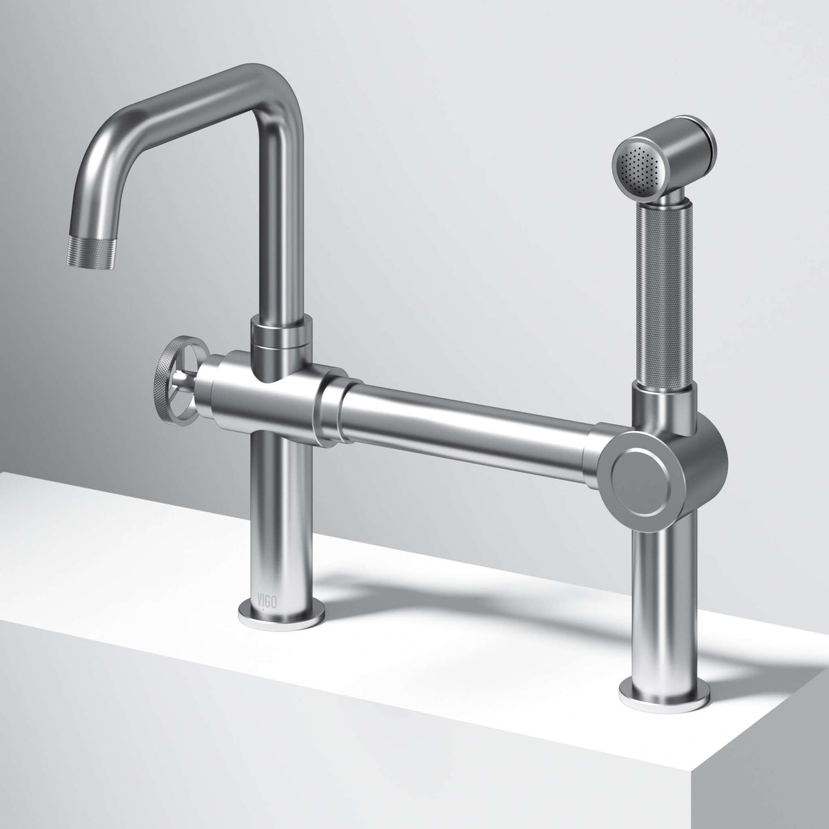 VIGO Cass kitchen faucet with sprayer in chrome finish featuring bridge design and pull-out side sprayer