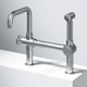 VIGO Cass kitchen faucet with sprayer in chrome finish featuring bridge design and pull-out side sprayer