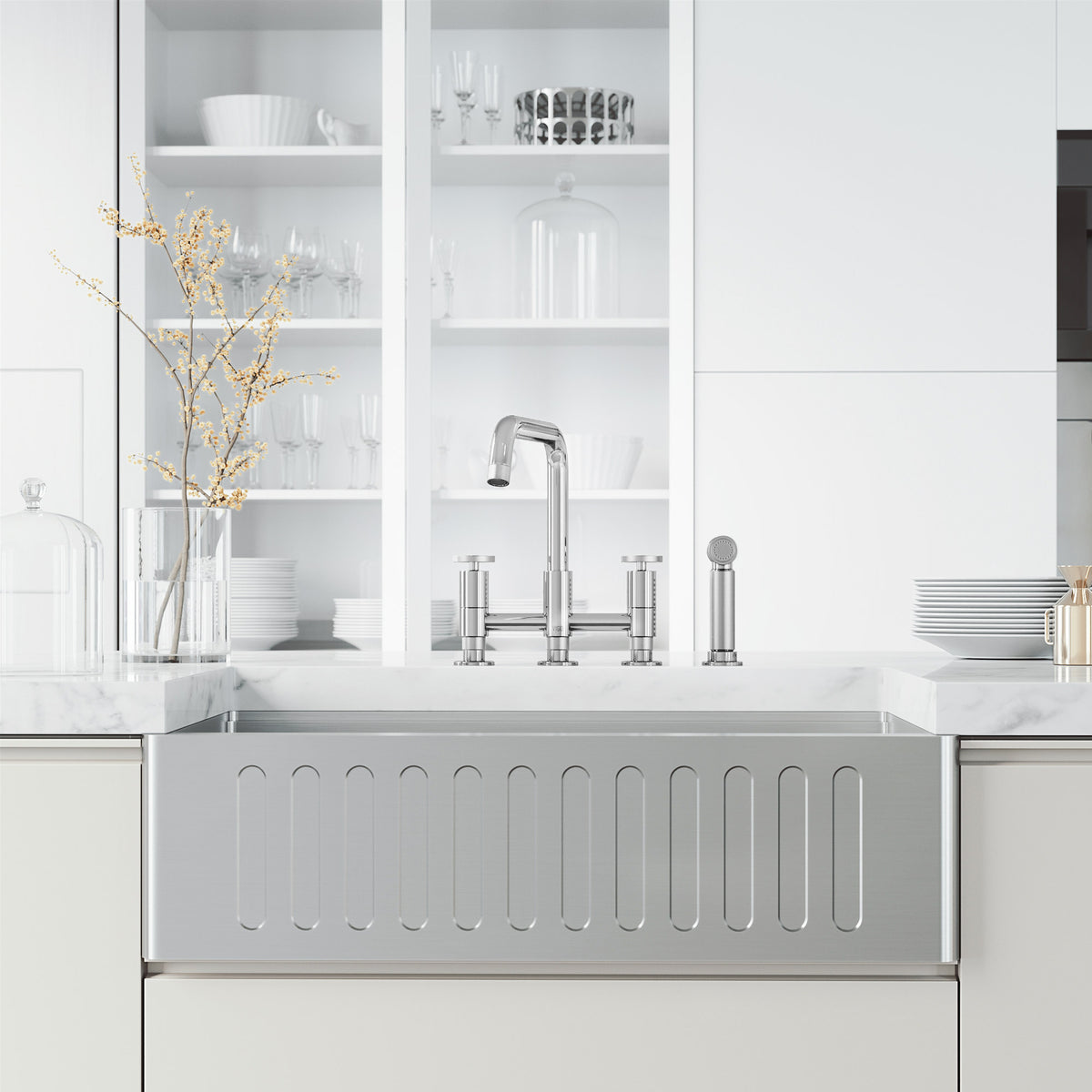 Deck mount kitchen faucet with included supply lines and sprayer head in chrome