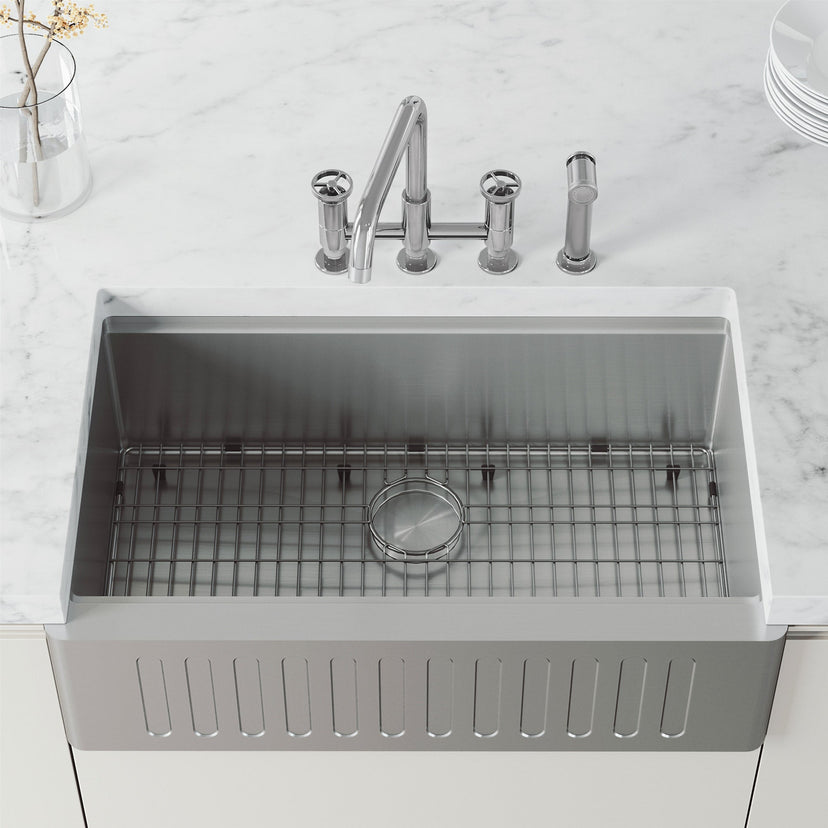 High-arc kitchen faucet with knob handles and side spray activation in chrome finish