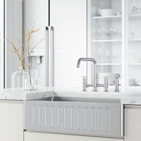 Brass kitchen faucet with ceramic valve and secure docking technology for sprayer