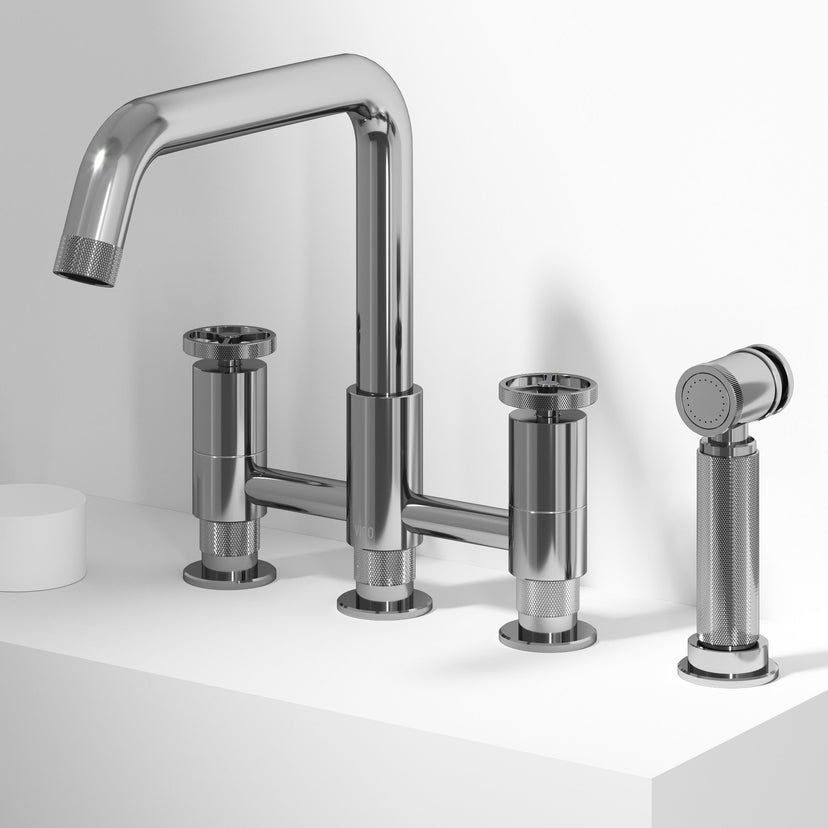 Chrome bridge faucet with side spray and compression fittings for deck mount