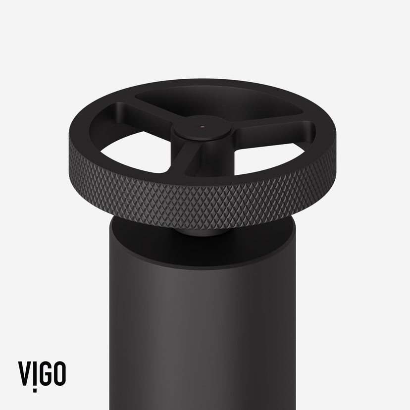 Matte black bridge kitchen faucet featuring 360-degree swivel spout and spot-resistant finish