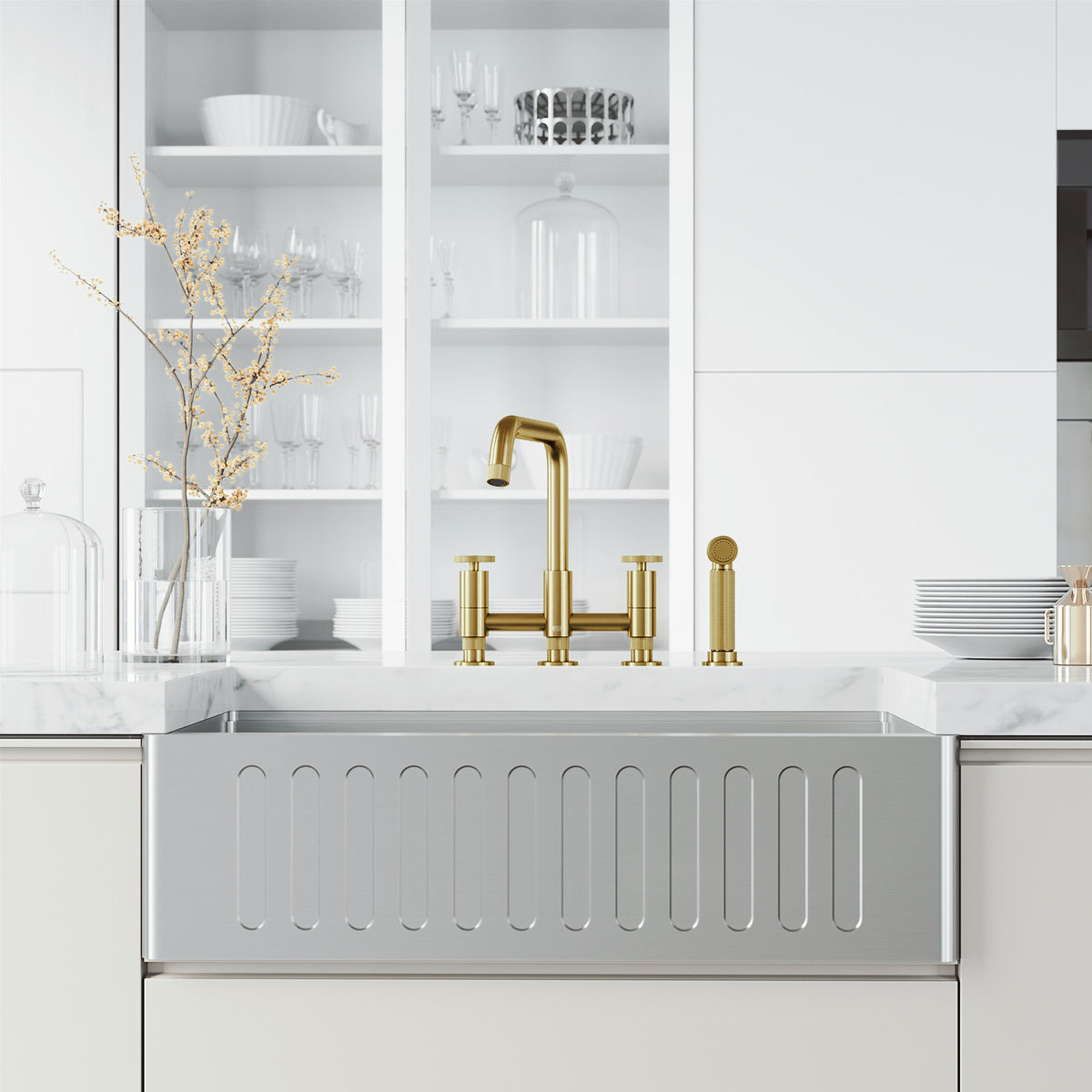 Deck mount kitchen faucet with included supply lines and sprayer head in matte brushed gold