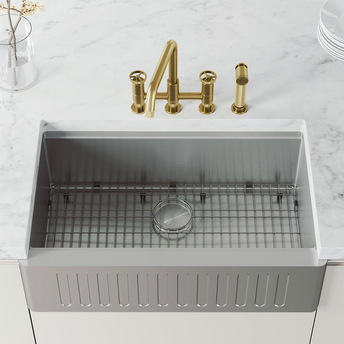 High-arc kitchen faucet with knob handles and side spray activation in matte brushed gold finish