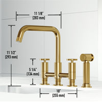 Matte brushed gold bridge faucet with side spray and 360-degree swivel spout for easy cleaning