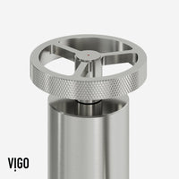 Stainless steel bridge kitchen faucet featuring 360-degree swivel spout and spot-resistant finish