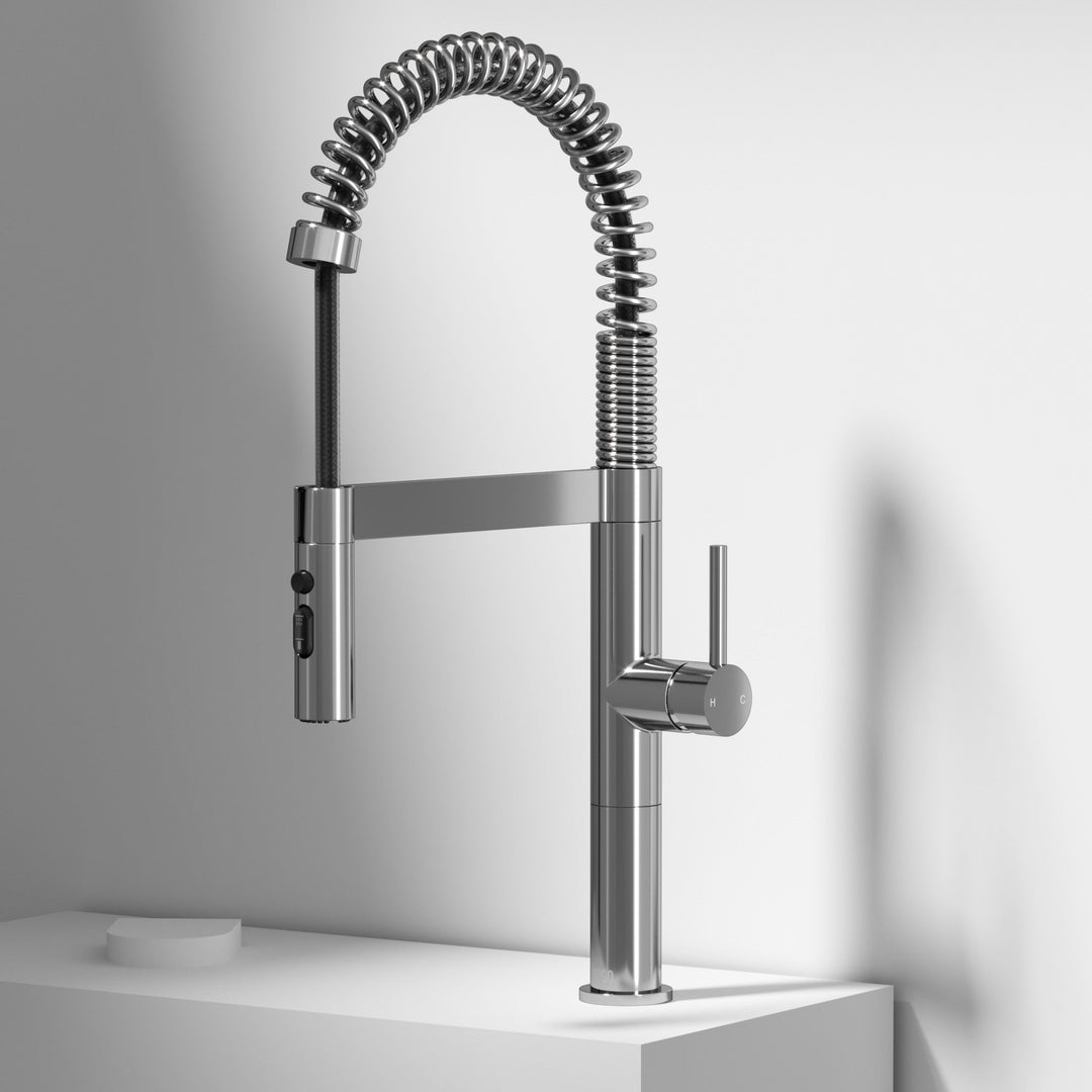 Modern kitchen faucet with high-arc spout and pull-down sprayer in chrome
