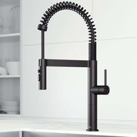 Edison Pro Pull-Down Spray Kitchen Faucet in stainless steel with matte black accents, high-arc spring neck, and triple-mode spray.