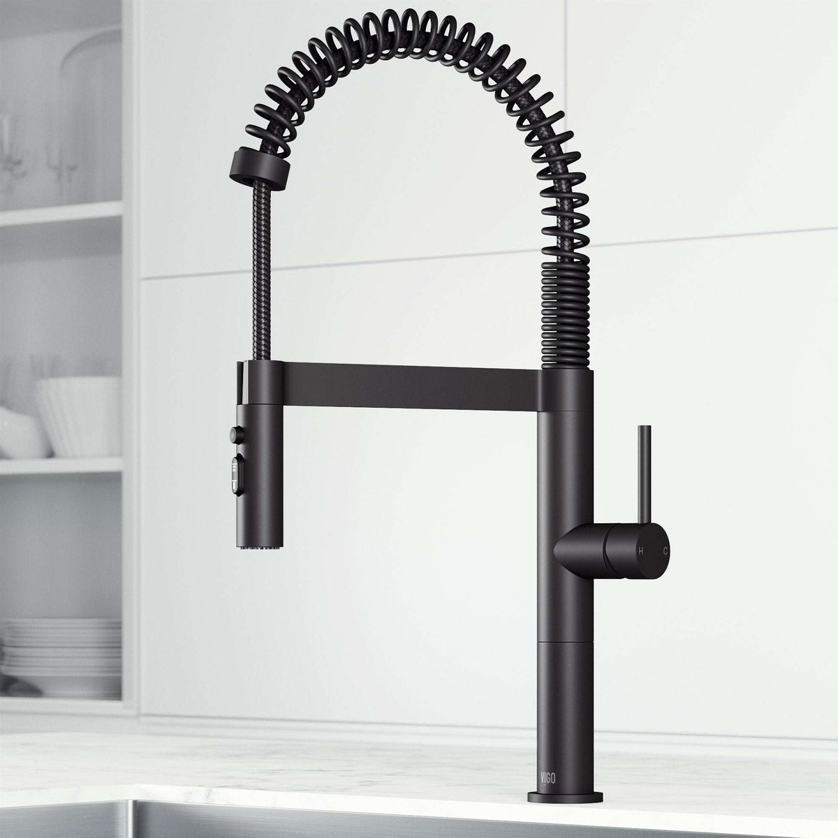 Edison Pro Pull-Down Spray Kitchen Faucet in stainless steel with matte black accents, high-arc spring neck, and triple-mode spray.