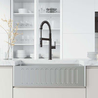 Edison Pro Pull-Down Spray Kitchen Faucet with stainless steel and matte black finish, high-arc spring neck, and triple-mode spray.