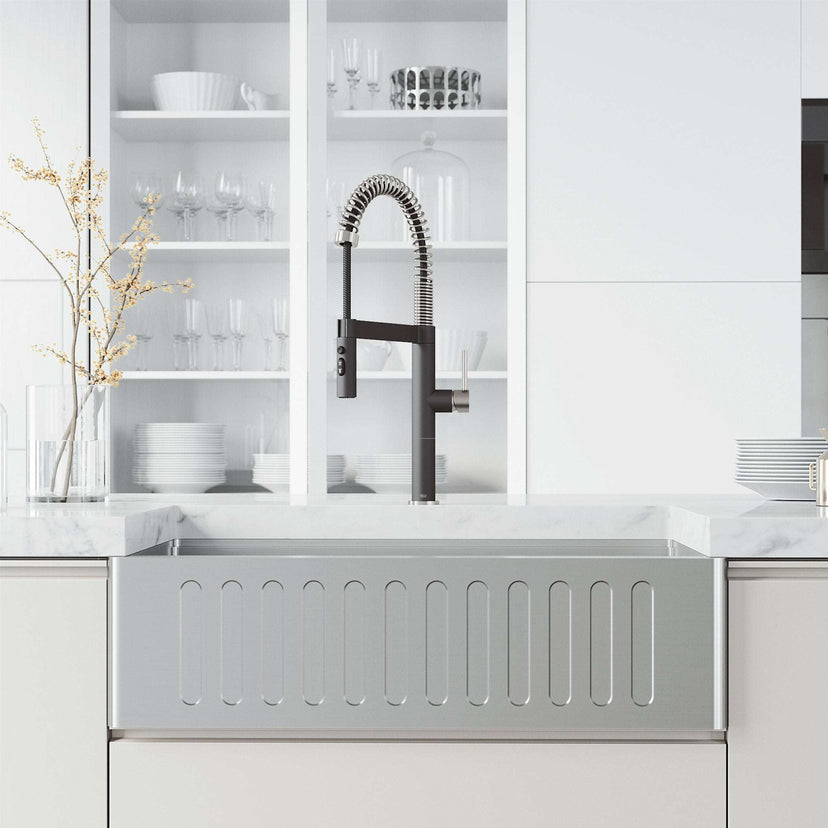 Edison Pro Pull-Down Spray Kitchen Faucet in stainless steel with matte black accents and flexible high-arc spring neck.