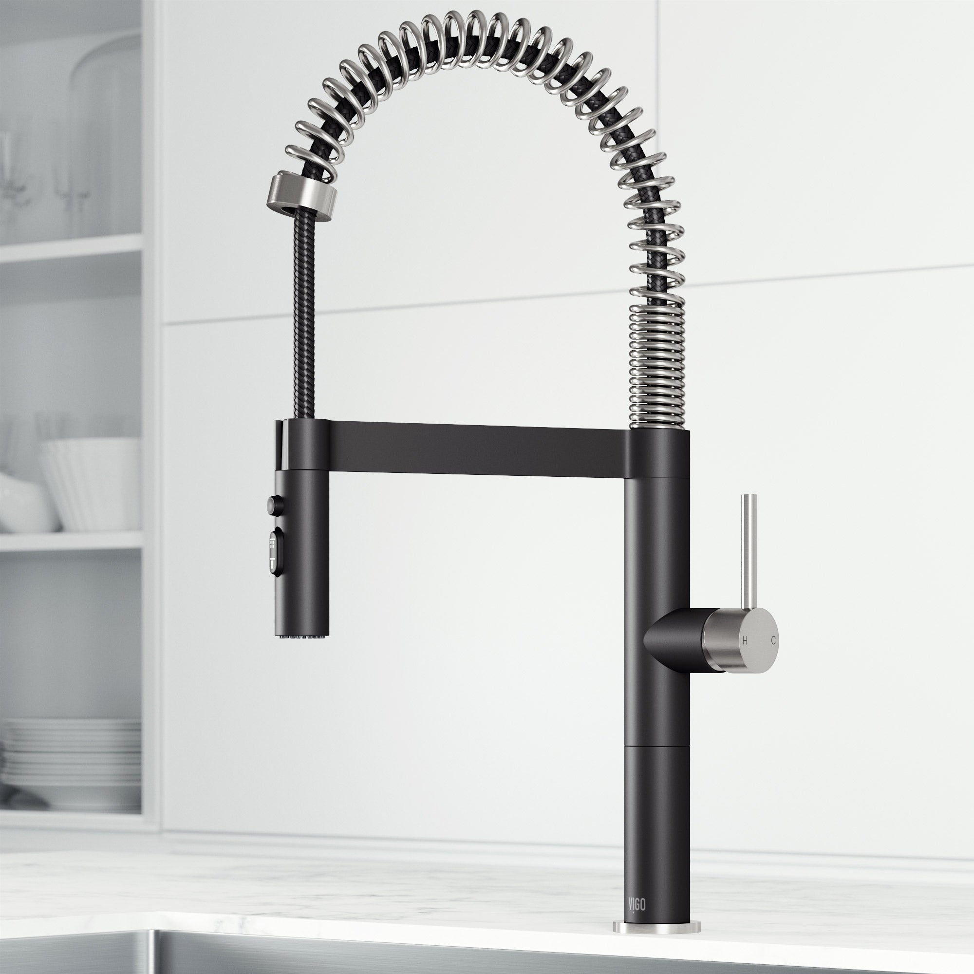 Steel and black single handle pull-down kitchen faucet with high-arc gooseneck spout