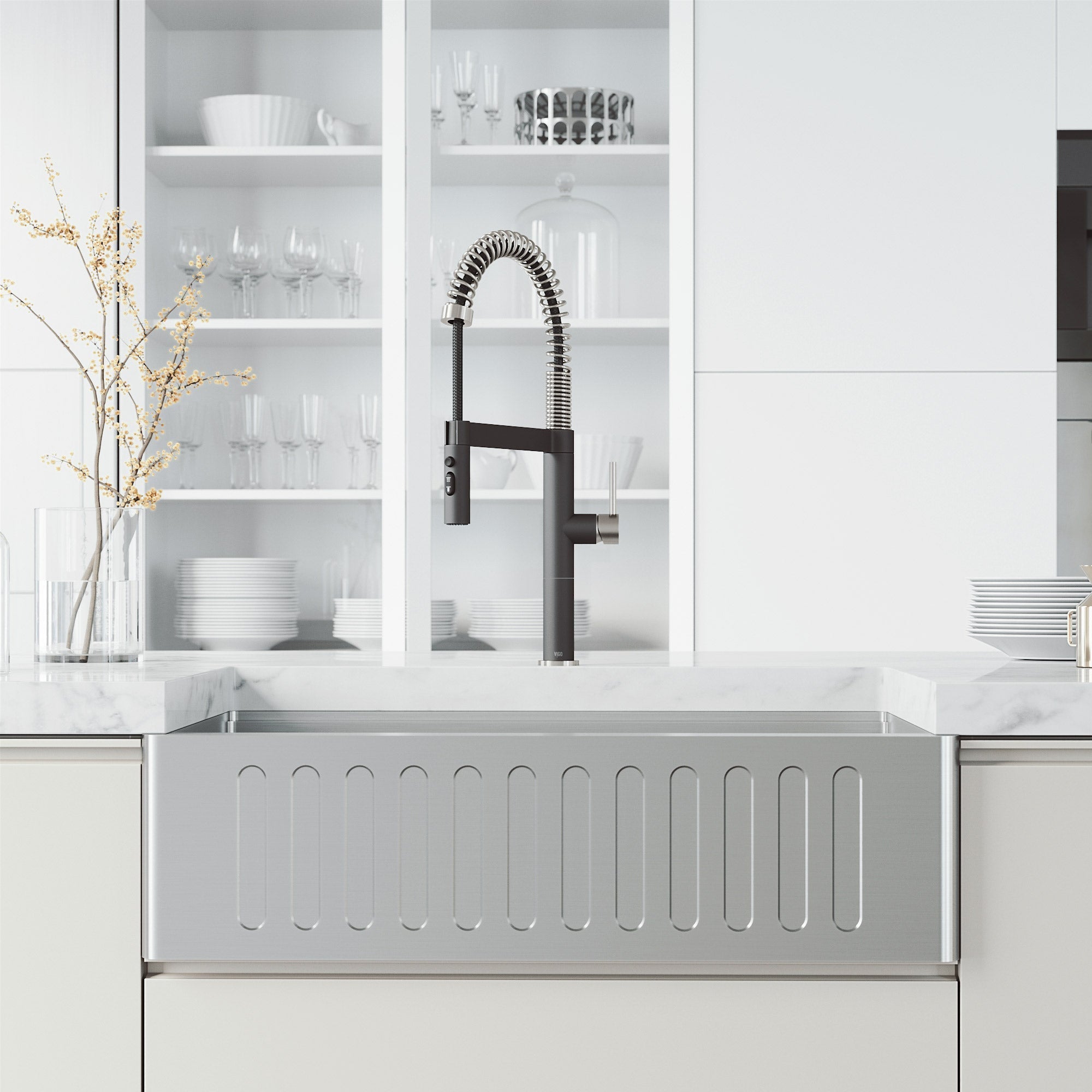 Water-efficient kitchen faucet with lever handle and pull-down sprayer in steel and black