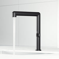 Modern deck-mounted kitchen bar faucet in matte black with 360-degree swivel spout