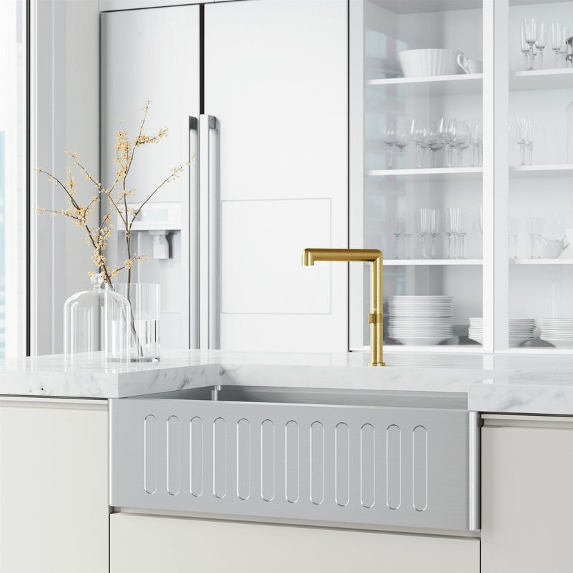 Matte brushed gold kitchen faucet with included hose and mounting materials