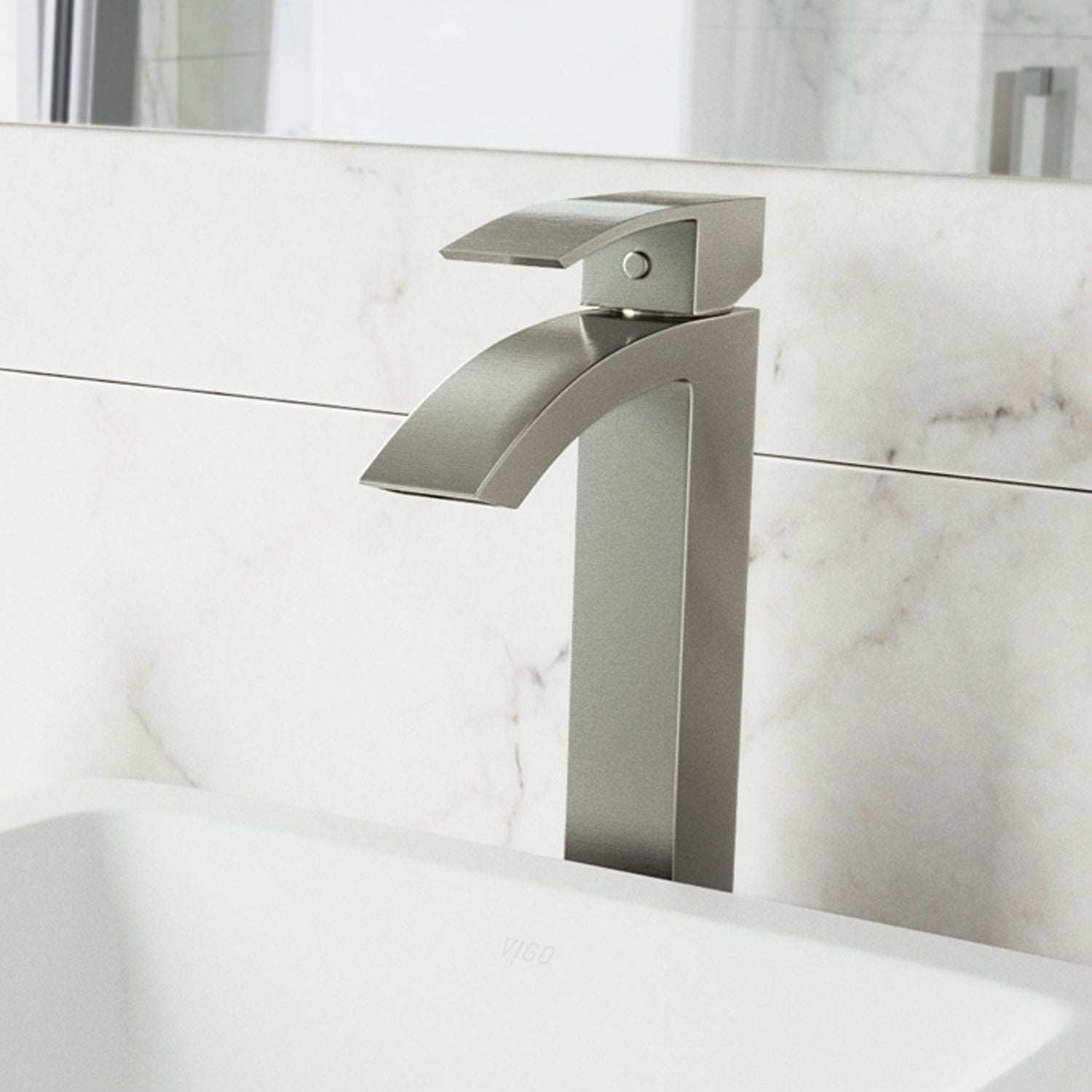 Brushed nickel vessel faucet with lever handle and waterfall spout