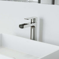 Brushed nickel vessel faucet with waterfall spout and lever handle