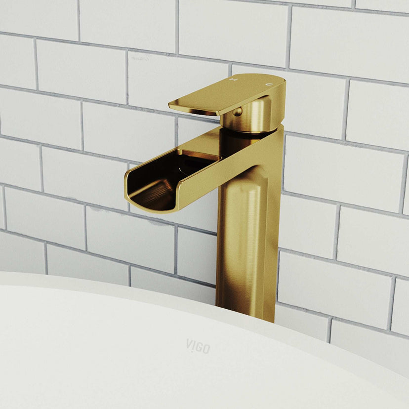 Matte brushed gold vessel faucet with waterfall spout and lever handle
