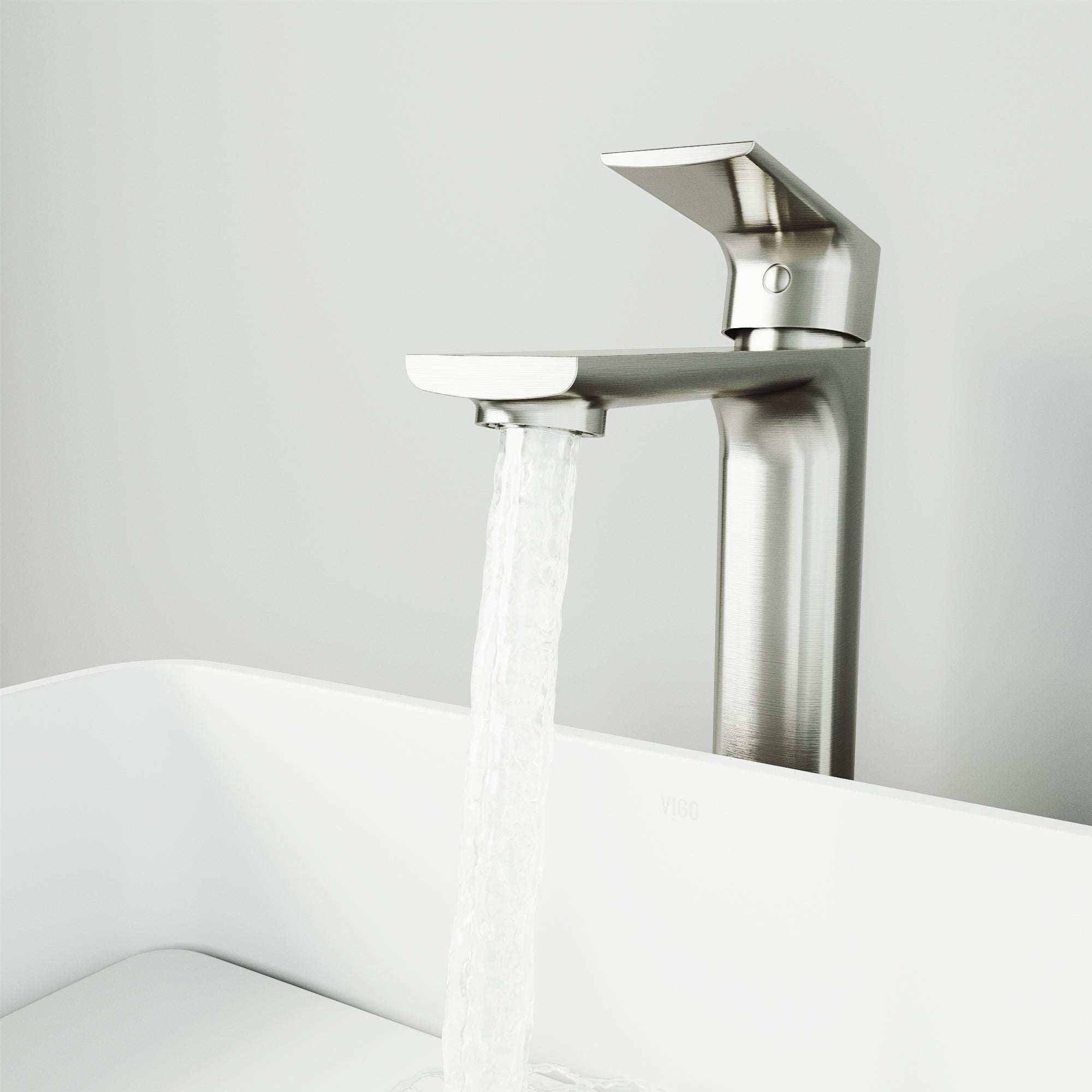 Brass vessel filler with brushed nickel finish and included mounting hardware